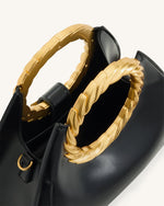 Amiya リーフハンドル彫刻バッグ - ブラック